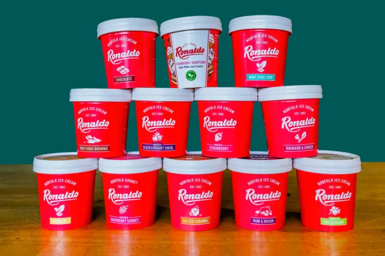 Ronaldo ice cream tubs in various flavors, stacked.