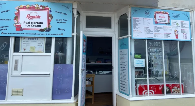 Ronaldo's Ice Cream Shop entrance with menu signs.